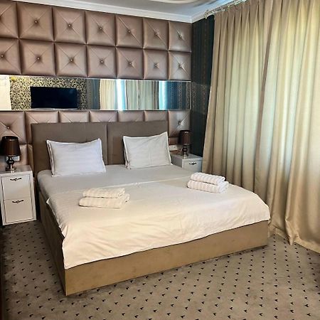 Orzu Hotel Наманган Экстерьер фото