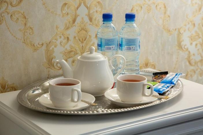 Orzu Hotel Наманган Экстерьер фото