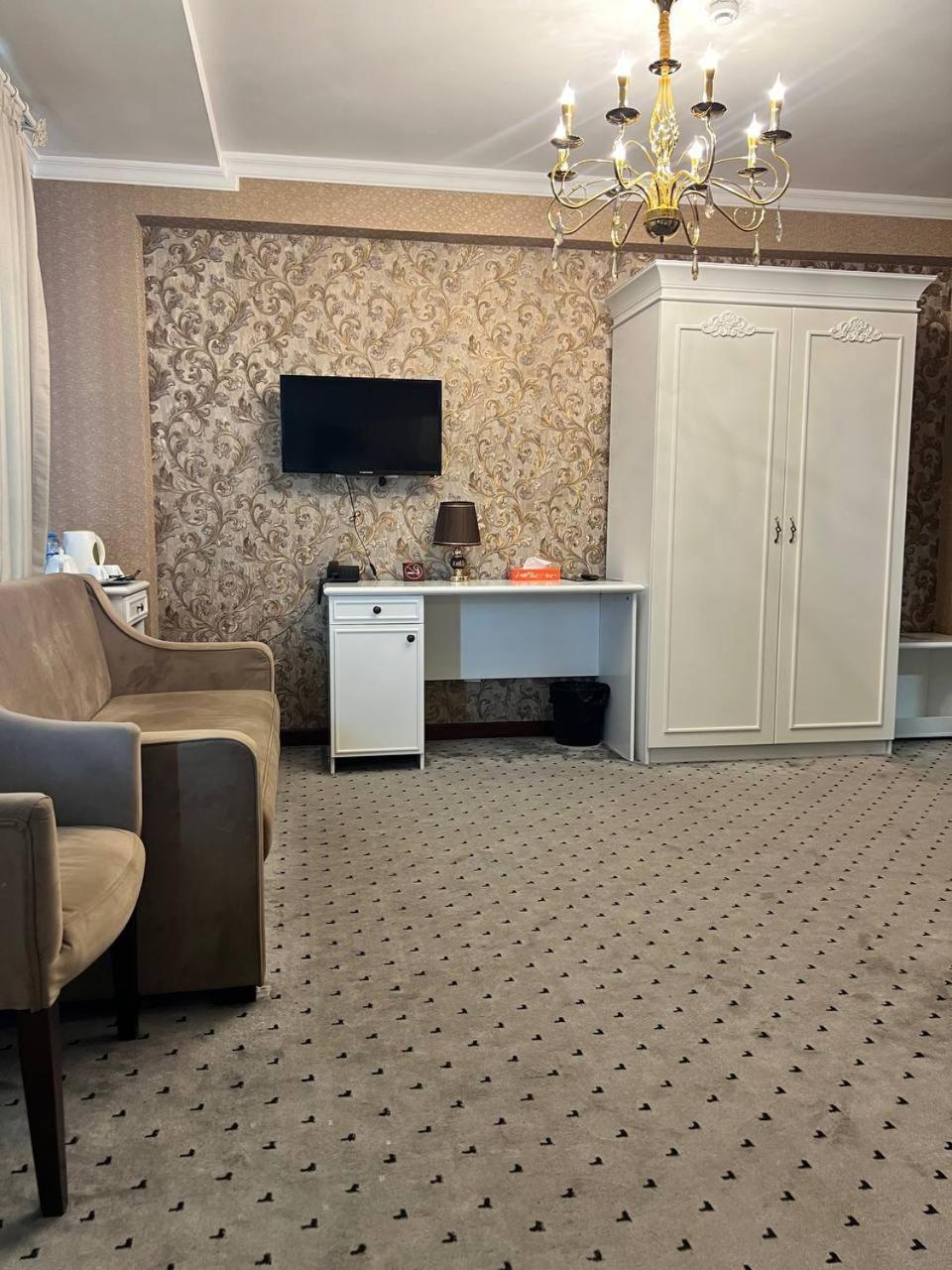 Orzu Hotel Наманган Экстерьер фото