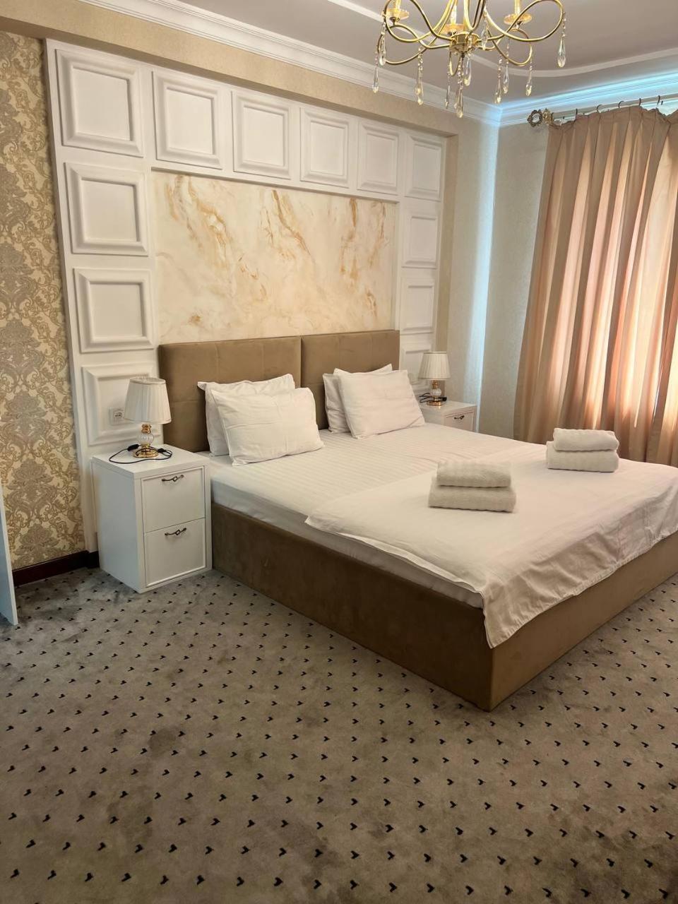 Orzu Hotel Наманган Экстерьер фото