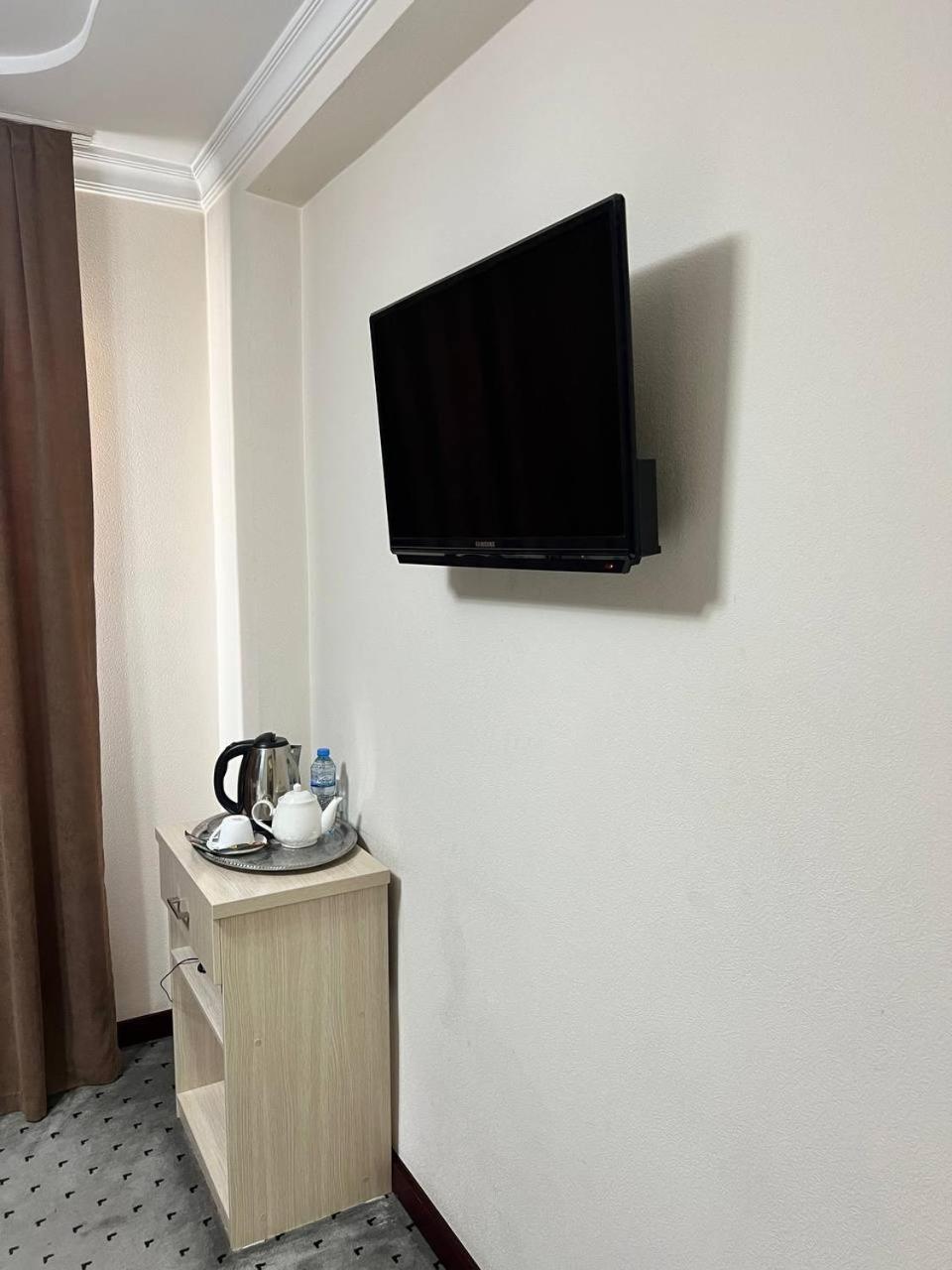 Orzu Hotel Наманган Экстерьер фото
