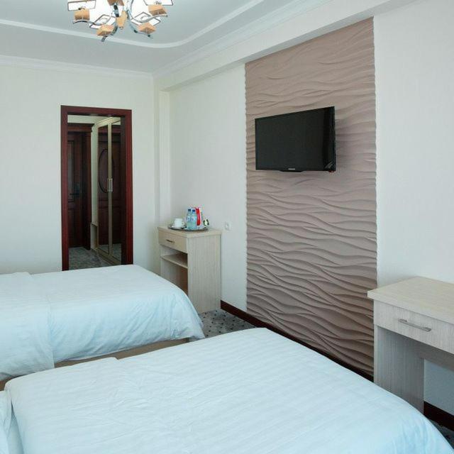 Orzu Hotel Наманган Экстерьер фото